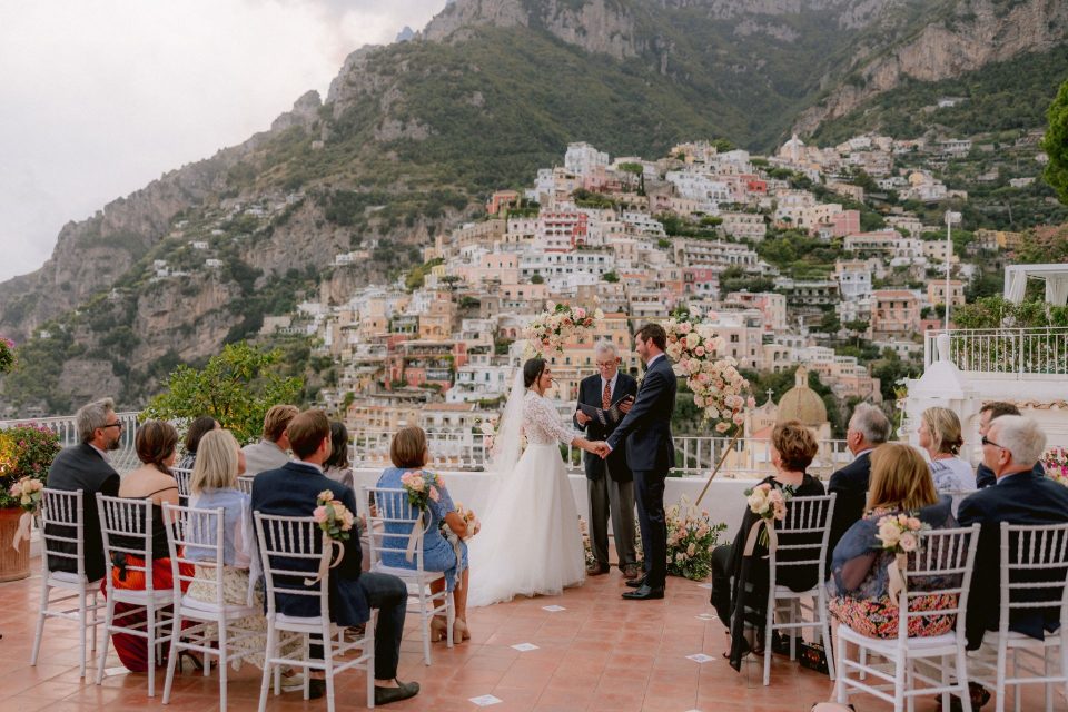 Bride and groom with guests on their wedding day in Positano