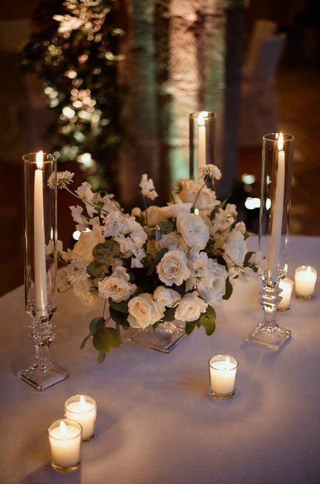 white flowers wedding table centerpiece with candels