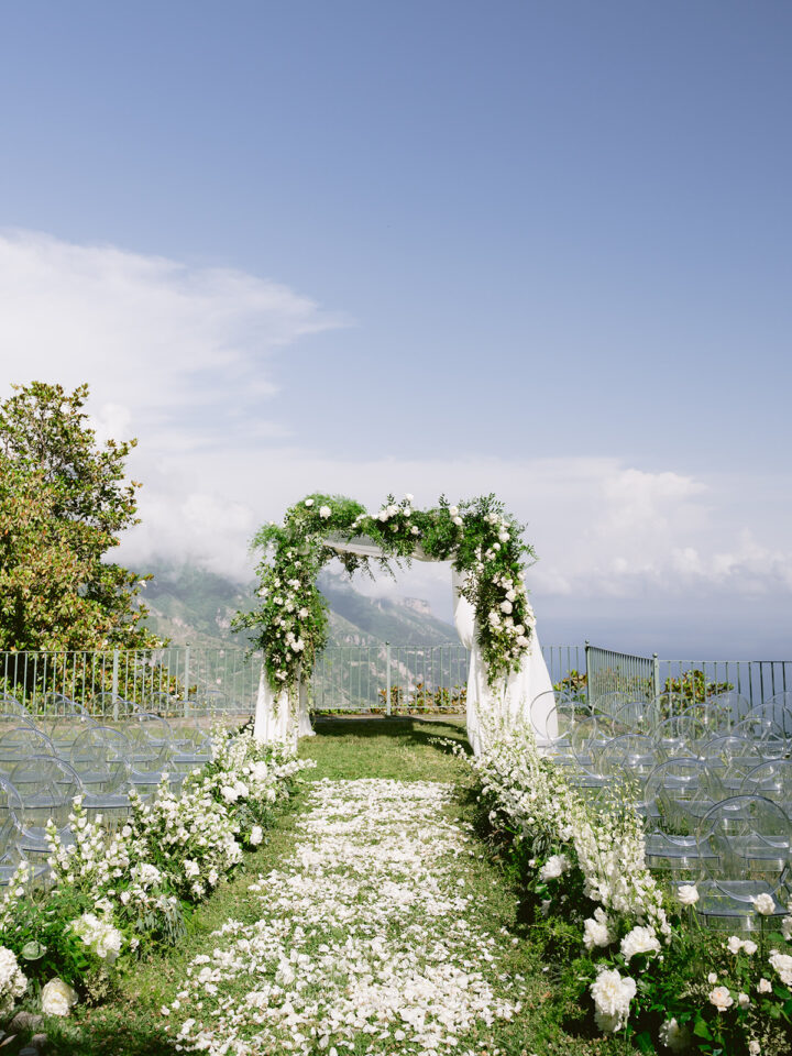 chuppah with white flowers and greenery for a Jewish wedding in Ravello